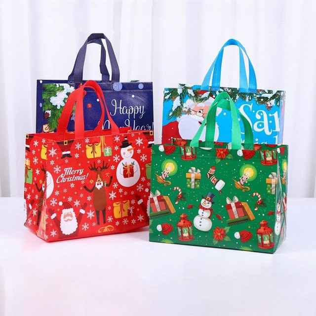 4er-Set Cyuan Weihnachts-Geschenktaschen aus Vlies mit Schneemann und Santa Claus für Süßigkeiten und Snacks - Bild 1