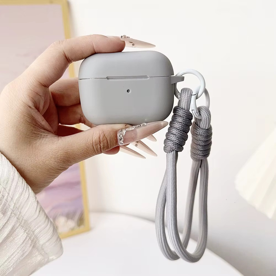 Slim Silikonhülle für Apple AirPods Pro 2 und AirPods 4 Pro 3. Generation mit Handgelenkband in Orange - Bild 3