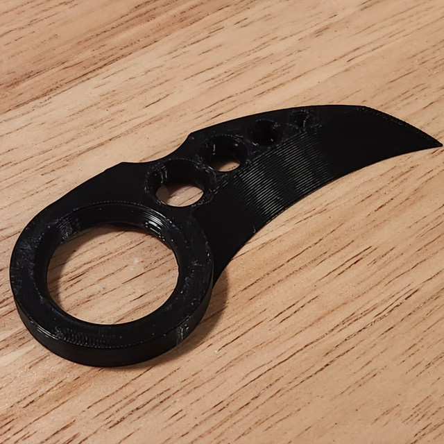 Praktischer Kartonöffner aus Kunststoff für schnelles Auspacken, erhältlich in Schwarz oder Weiß - Bild 1