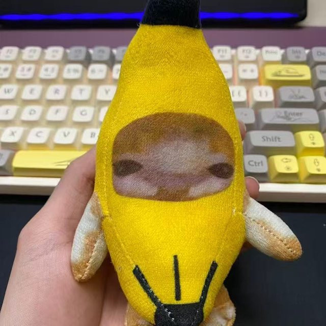 Banane Katze Puppe Anhänger, Plüsch / Textil, mit Sound, ab 14 Jahren - Bild 1