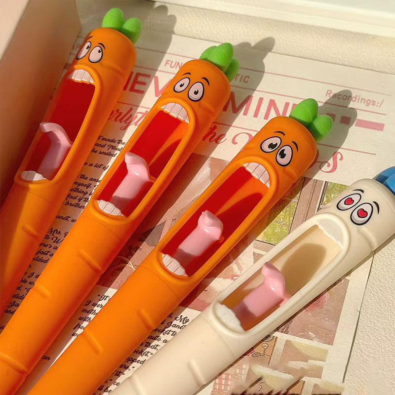 Set mit 4 Karottenförmigen Gelstiften in Orange mit lustigem Zungenmechanismus und 0,5 mm schwarzer Tinte - Bild 2