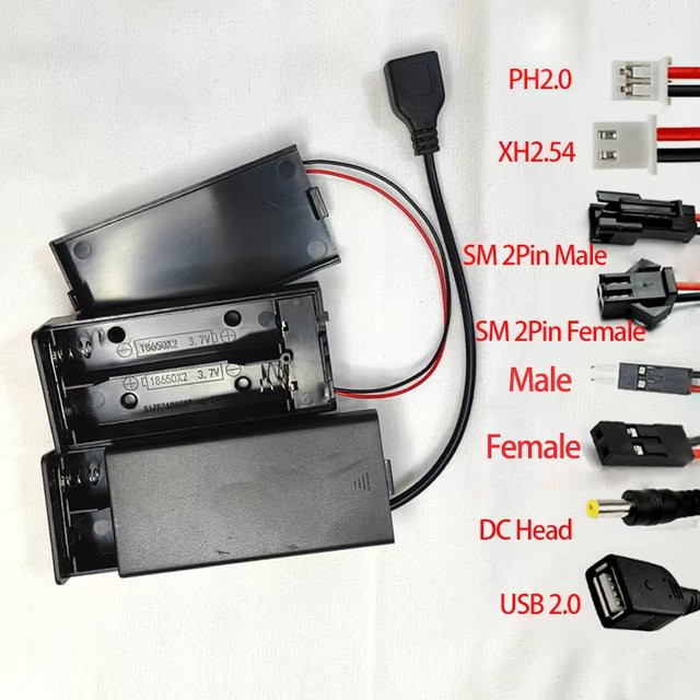JCD 18650 Batteriehalterbox in Schwarz mit 2 Steckplätzen, Schalter, Abdeckung und Anschlüssen für PH2.0, XH2.54, DC5.5x2.1 und USB 2.0 - Bild 1