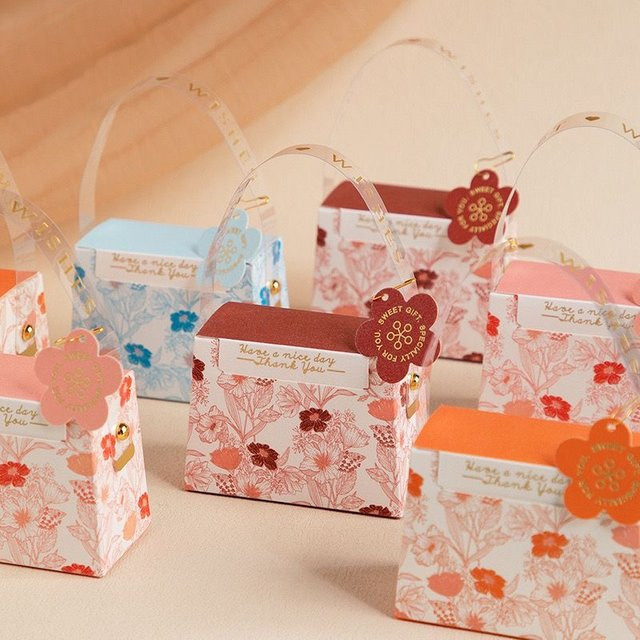 10er-Pack Premium-Geschenkboxen aus Papier in Orange mit Bandgriffen und dekorativen Verzierungen für besondere Anlässe - Bild 1