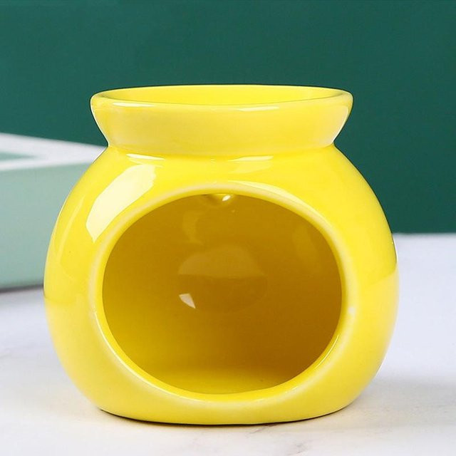Weißer Aromaölbrenner aus Keramik für ätherische Öle und Tealight als dekorativer Duftofen - Bild 1