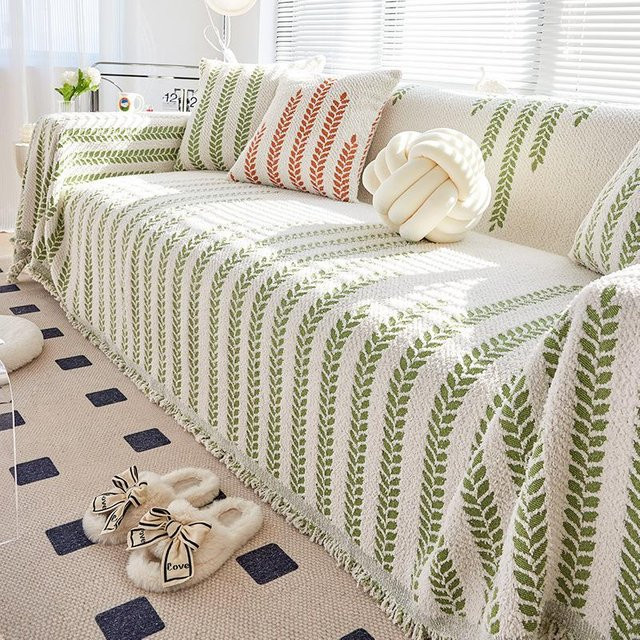 Nordische Sofa-Überwurfdecke von Your Warm Home in Grün mit floralem Strickmuster und Quasten, B/B: 180 x 130 cm - Bild 1
