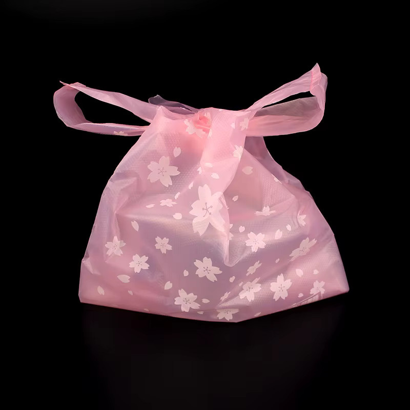 100 Stück verdickte Plastiktüten mit Griff in Pink für Party und Geschenke - Bild 2