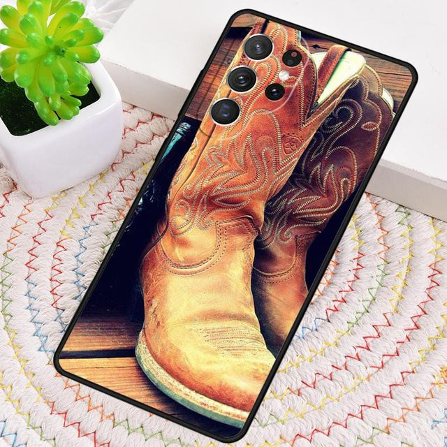 Stoßfeste Samsung Handyhülle im Cowboy Cowgirl Design mit Stiefeln, Sporen und Hut in Braun - Bild 1