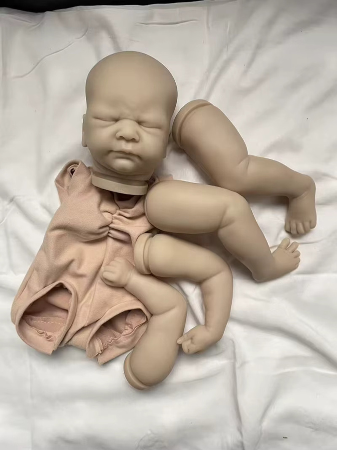 Kovu Sleeping Reborn Baby Doll Kit, 17 Zoll, unbemalte DIY Puppenteile mit Stoffkörper, Sammlerpuppe - Bild 1