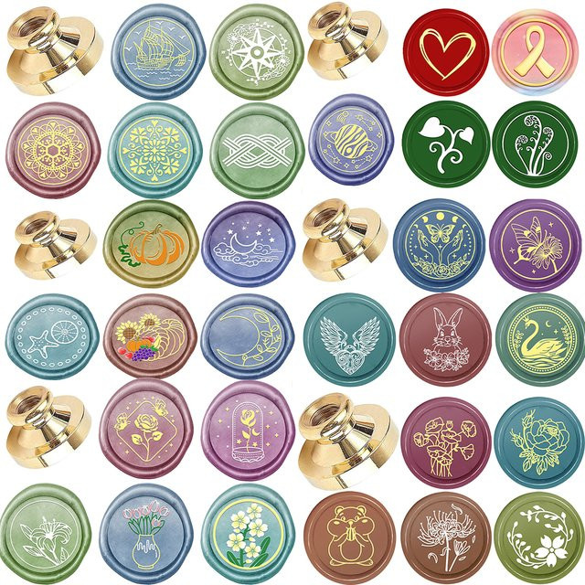 Wachssiegel-Set mit abnehmbarem Messingkopf für Geschenke und Postkarten, verschiedene Motive wie Schwan, Tulpe, Rose, Seestern, Zitrone, Kürbis, Mond und Planet, mehrfarbig - Bild 1