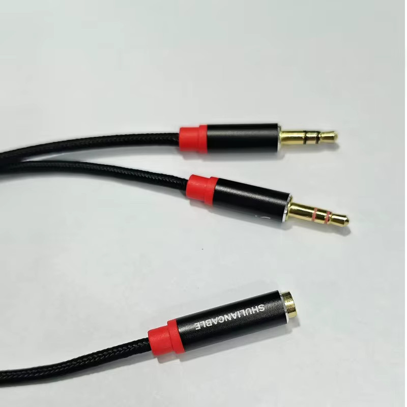 Shuliancable Kopfhörer-Splitter Schwarz mit 3,5 mm Buchse und 2 Paar 3,5 mm TRRS-Steckern für PC-Verbindung - Bild 1