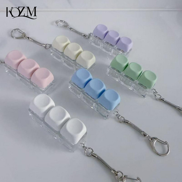 LED-Tastenkappen Schlüsselanhänger in Macaron-Farben mit 4 Tasten als Dekompressionsspielzeug für deine DIY-Tastatur - Bild 1
