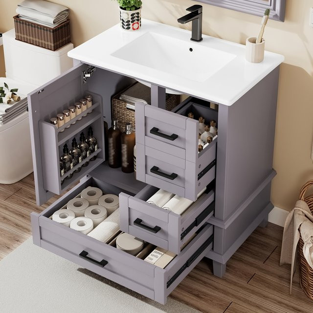 HAUSS SPOLE Badezimmerschrank mit Keramikwaschbecken in Grau, moderner Waschbeckenunterschrank mit Schubladen und Türen, matt - Bild 1