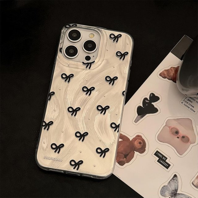 Handyhülle für Apple iPhone mit weißem Punktmuster und schwarzer Schleife in glänzendem Design - Bild 1