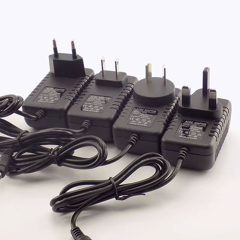 AC DC Netzteil Adapter 12V 2A 2000mA mit EU UK AU US Stecker für LED Streifen und Lampen, Anschluss 5,5mm x 2,5mm - Bild 3