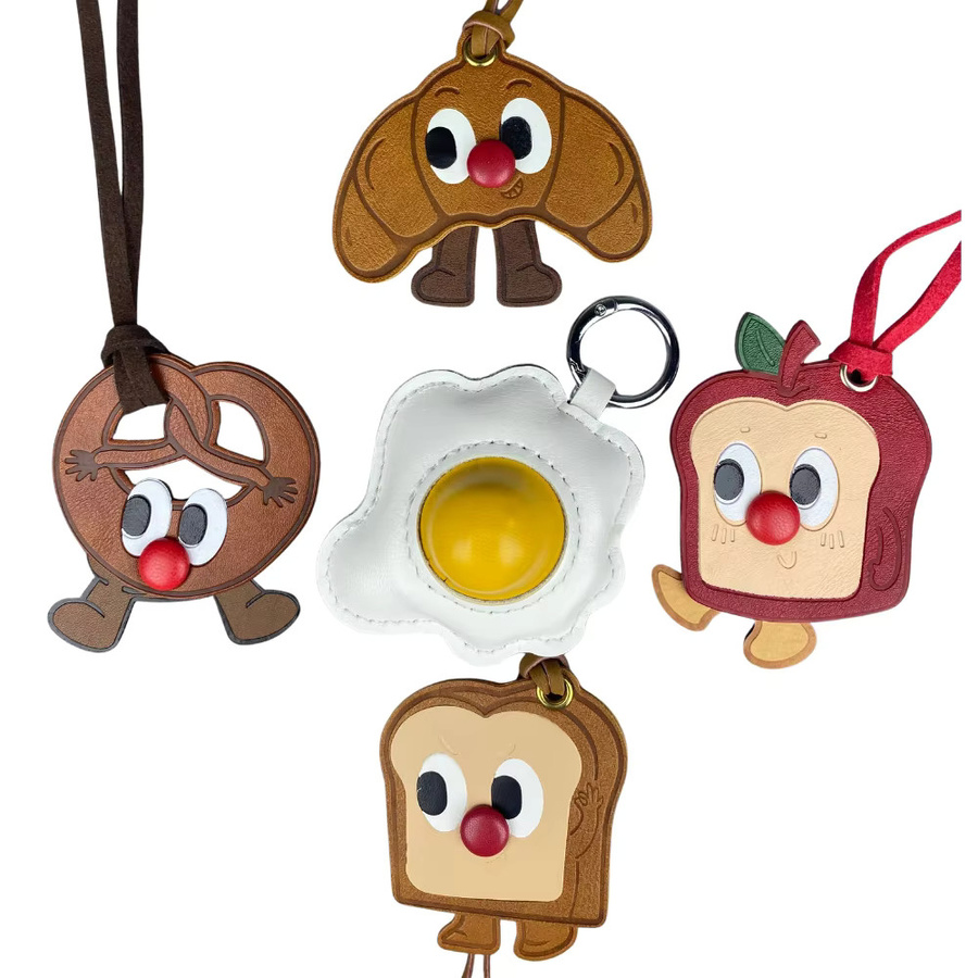 Wiggle & Whimsy Schlüsselanhänger, Cartoon-Toast und Ei, PU-Leder, Unisex - Bild 1