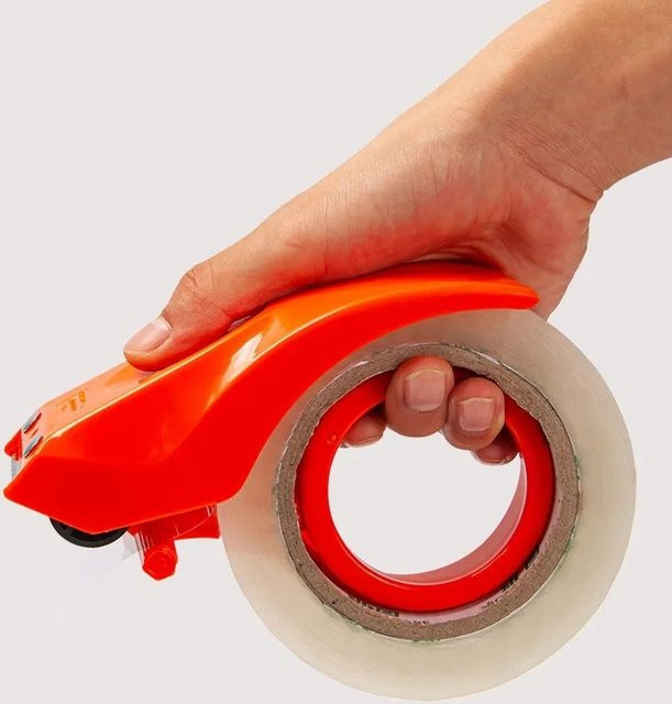 Professionelle Verpackungsmaschine und Schneidemaschine für 5-cm-Boxen aus Metall und Kunststoff in Gelb und Orange - Bild 1