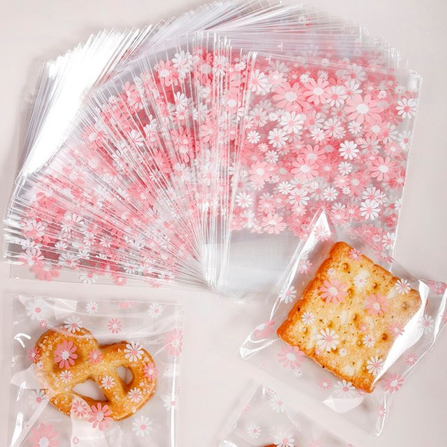 100 Stück transparente Blumen-Verpackungsbeutel in Rosa, selbstklebende Kunststoffbeutel für Süßigkeiten, Kekse und Lebensmittel - Bild 1