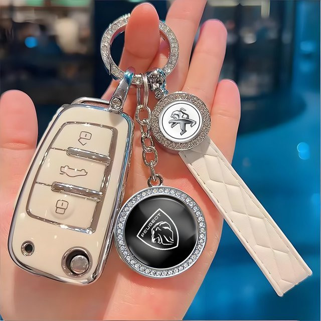 Peugeot Schlüsselanhänger, Zinklegierung - Bild 1