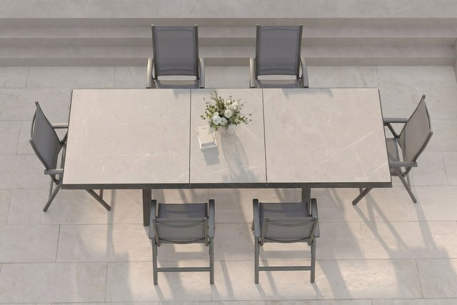 OUTFLEXX Serro Garten-Essgruppe in Schwarz und Grau mit Tisch und 6 Klappstühlen aus Aluminium, Steinimitat und Textilene - Bild 1
