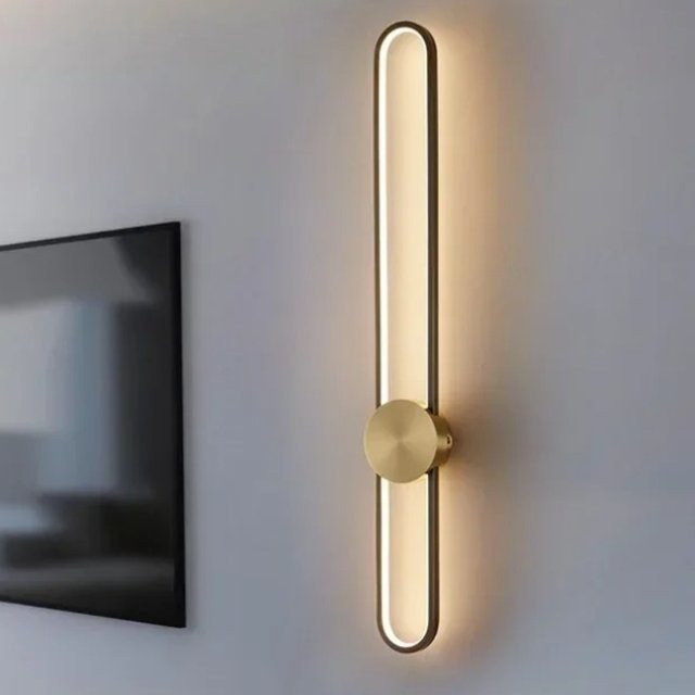Moderne lineare LED-Wandleuchte von Claeted in Gold/Messing mit warmweißem Licht für Wohnzimmer und Schlafzimmer - Bild 1