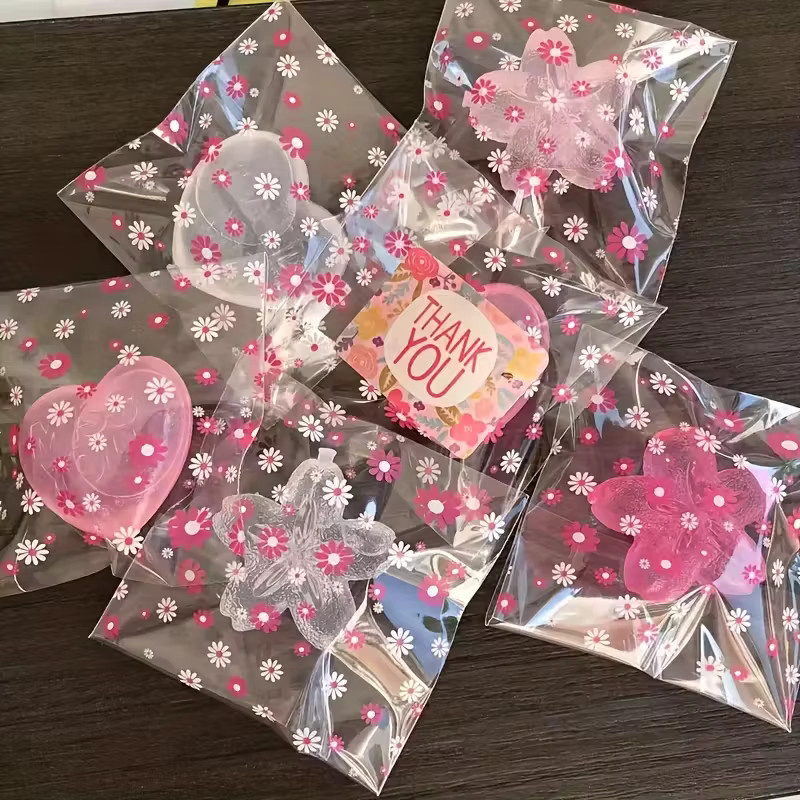 100 Stück transparente Blumen-Verpackungsbeutel in Rosa, selbstklebende Kunststoffbeutel für Süßigkeiten, Kekse und Lebensmittel - Bild 2