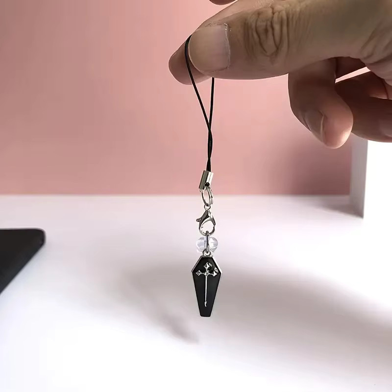 Kreuz-Handy-Staubstopfen im gotischen Stil mit Karabinerverschlussseil in Schwarz zum Schutz des Ladeanschlusses - Bild 1