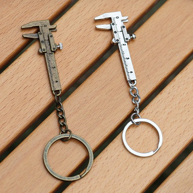 Mini Messschieber Schlüsselanhänger in Bronze von Zinan als praktisches Messwerkzeug und Zubehör - Bild 1