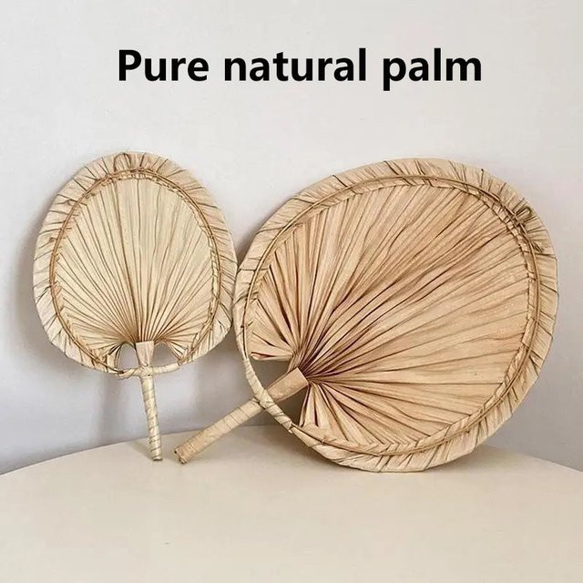 Handgefertigter Rattan-Fächer aus natürlichen Palmblättern in Beige als Wandkunst und rustikale Dekoration - Bild 1