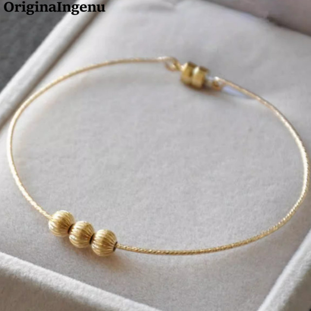 OriginaIngenu Armreif, 14 Karat Gold gefüllte Perlen, Draht-Stapelarmband - Bild 1