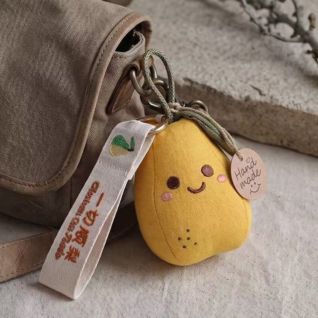 Yiran Health & Beauty Birnen-Rucksack-Anhänger, Plüschtier, 22cm, ab 14 Jahren - Bild 1
