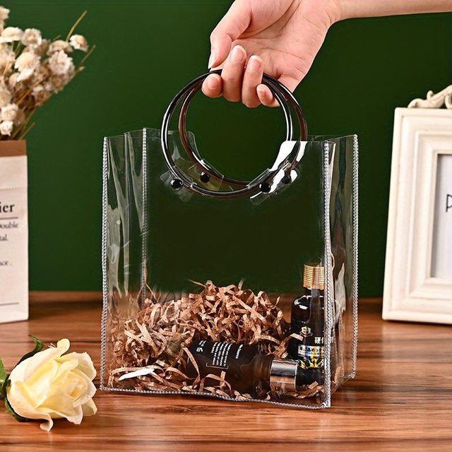 Transparente PVC Geschenktasche von SZwatch mit Metallring in Schwarz - Bild 1