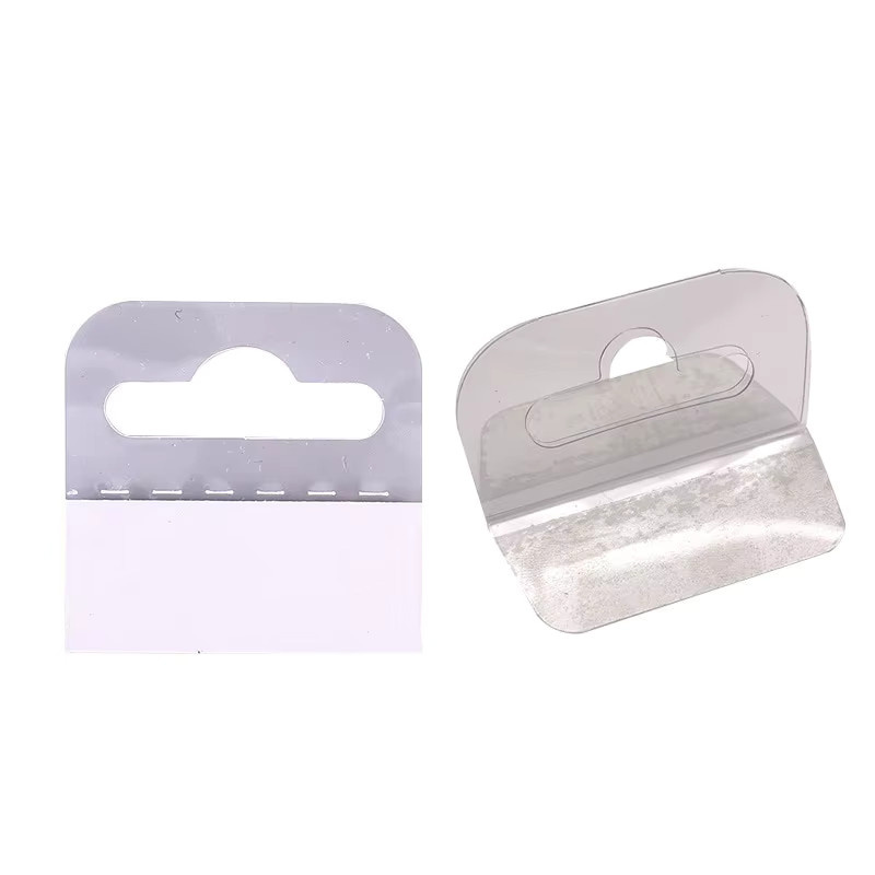 100 Stück PVC Slot Hole Kleber Haken Tags in Transparent für Merchandise Display und Paketboxen - Bild 1
