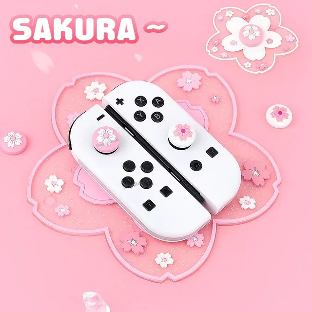 HeroAngel 4er-Set Silikon Thumbstick-Kappen in Rosa für Nintendo Switch OLED und Lite - Bild 1
