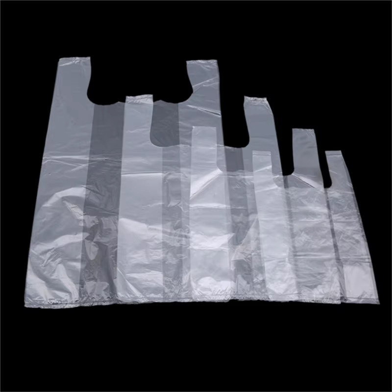100 Stück transparente Plastiktüten mit Griff als tragbare Einkaufstaschen und Lebensmittelverpackungstaschen - Bild 2