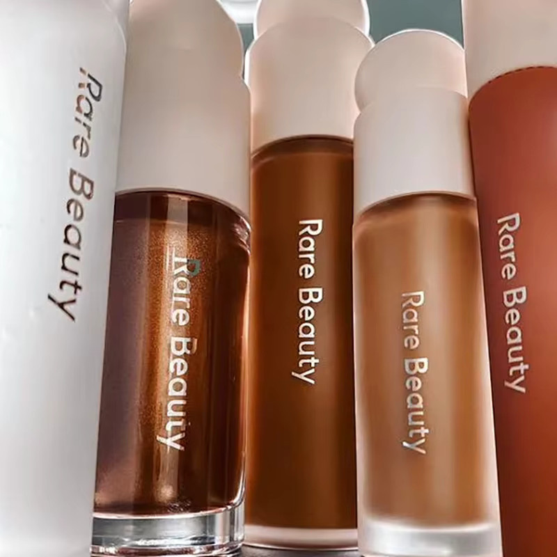Rare Beauty Foundation Luminous Agent, Bronze, Glänzend - Bild 3