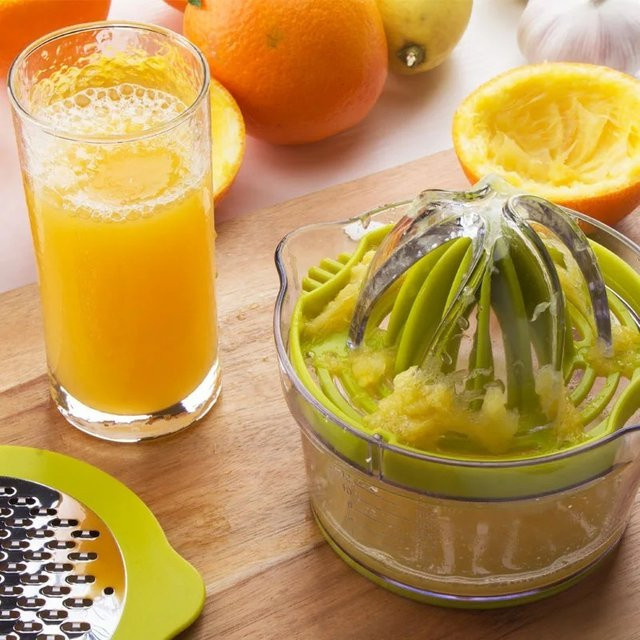 Galavilly 4-in-1 Manuelle Zitruspresse für Zitronen und Orangen mit integriertem Messbecher und Reibe in Rundform aus Kunststoff - Bild 1