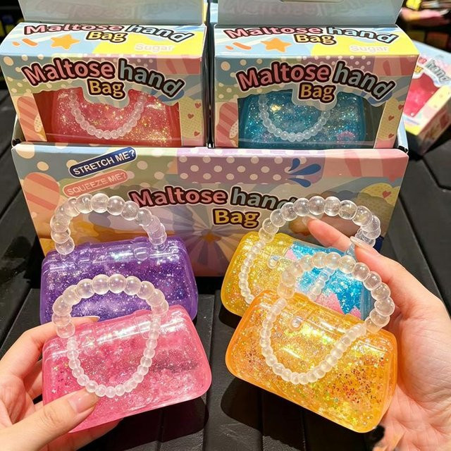 12-teiliges Set TPR Malzzucker-Gefüllte Glitzer-Geldbörse Squishy Spielzeug, langsam aufsteigend - Bild 1