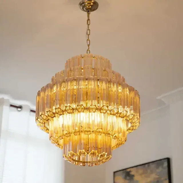 Moderne Kristall-Pendelleuchte von JIANKEXING in Transparent mit Gold/Messing-Details für Wohnzimmer und Schlafzimmer - Bild 1