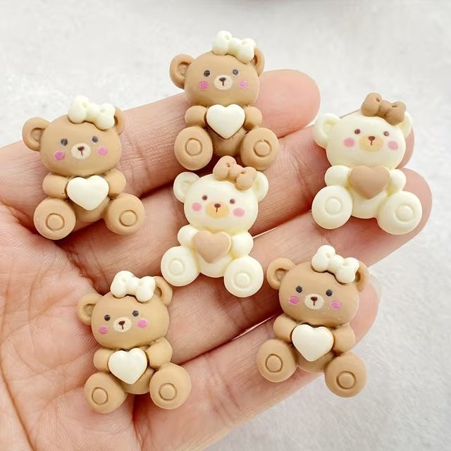 Set mit bunten Kunstharz-Charms in Form von Schleifen, Herzen und Bären für deine DIY-Bastelarbeiten und Scrapbooking, 10 bis 100 Stück - Bild 1