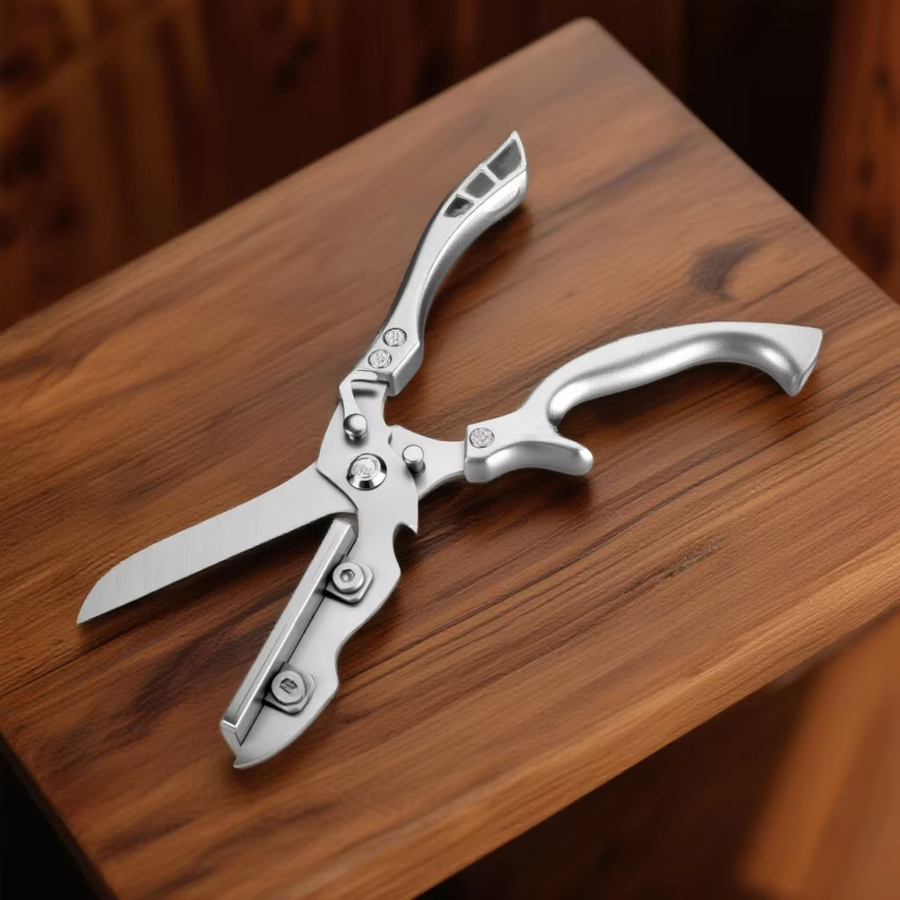 2-in-1 Schneidebrettschere aus Edelstahl in Silber für Geflügel, Gemüse und Grillgut mit integriertem Schloss - Bild 5
