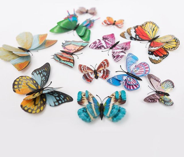 12 Stück Rui Di Leuchtende 3D Schmetterling Wandaufkleber in Multicolour zur Hochzeitsdekoration und als Kühlschrankmagnet - Bild 1