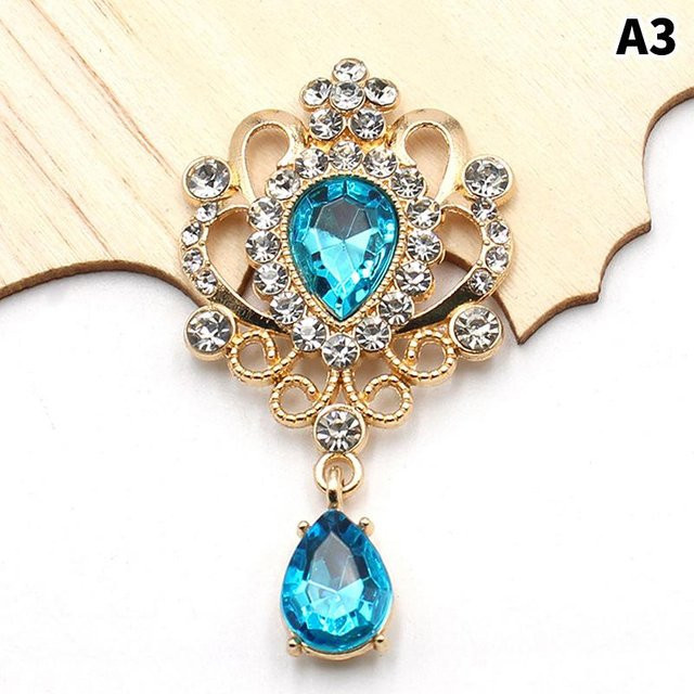 Goldene Strass-Tasten aus Metall und Resin für Handarbeiten und DIY-Projekte, B/H: 60 x 32 mm - Bild 1