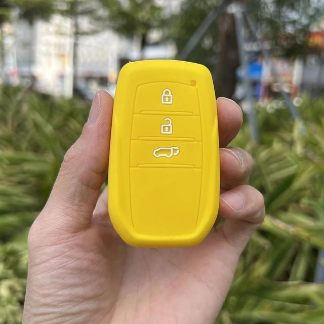 Silikon Autoschlüsselhülle Abdeckung für Toyota Land Cruiser 200 300 Prado Crown Yaris Cross Hilux Innova Fortuner Camry in Gelb - Bild 1