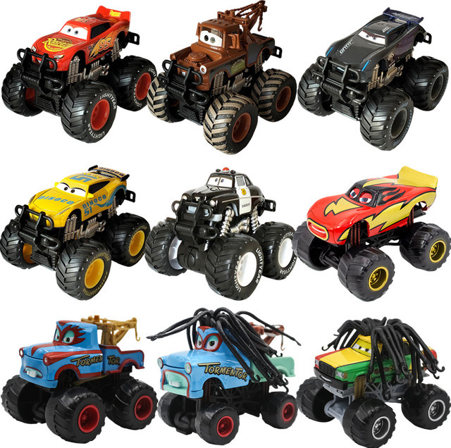 TAKARA TOMY Disney Pixar Cars Lightning McQueen und Jackson Storm Big Wheel Offroad-Fahrzeug Set mit Pullback-Funktion - Bild 1
