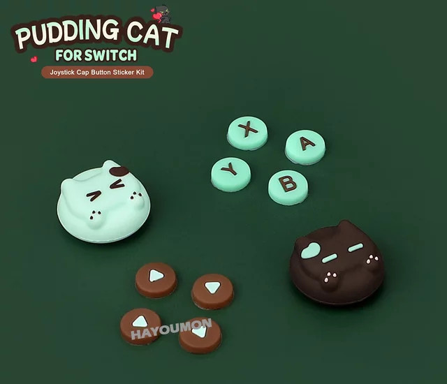 Hayoumon Pudding-Katzen Silikon D-Pad Tastenkappen und Thumbstick Griffabdeckungen für Nintendo Switch und Switch Lite inklusive ABXY-Tasten-Aufklebern, Mehrfarbig - Bild 1