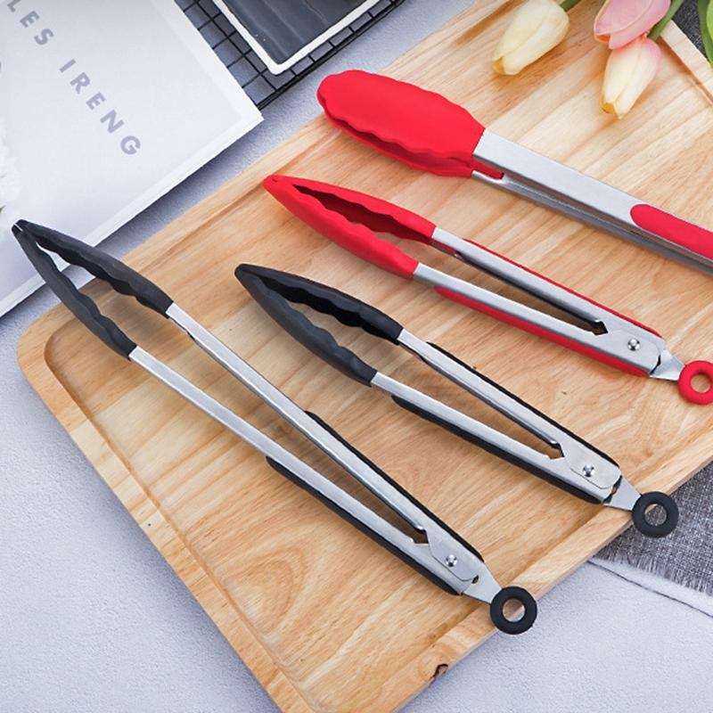 Edelstahl Grillzange mit Silikonaufsatz für BBQ und Küche in Schwarz und Silber - Bild 1