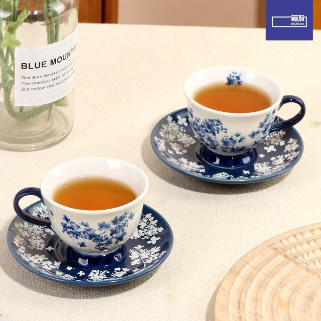 SHUNXIANG Keramik Kaffeetassen- und Untertassen-Set mit floralem Retro-Blumenmuster, 100 ml - Bild 1