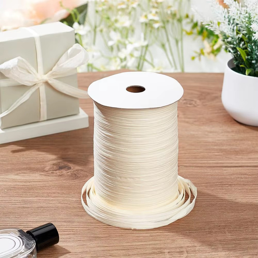 Bastband aus Papier für Bastelarbeiten und Geschenkverpackungen, Breite: 0,6 cm bis 0,65 cm, Länge: 300 Meter - Bild 2
