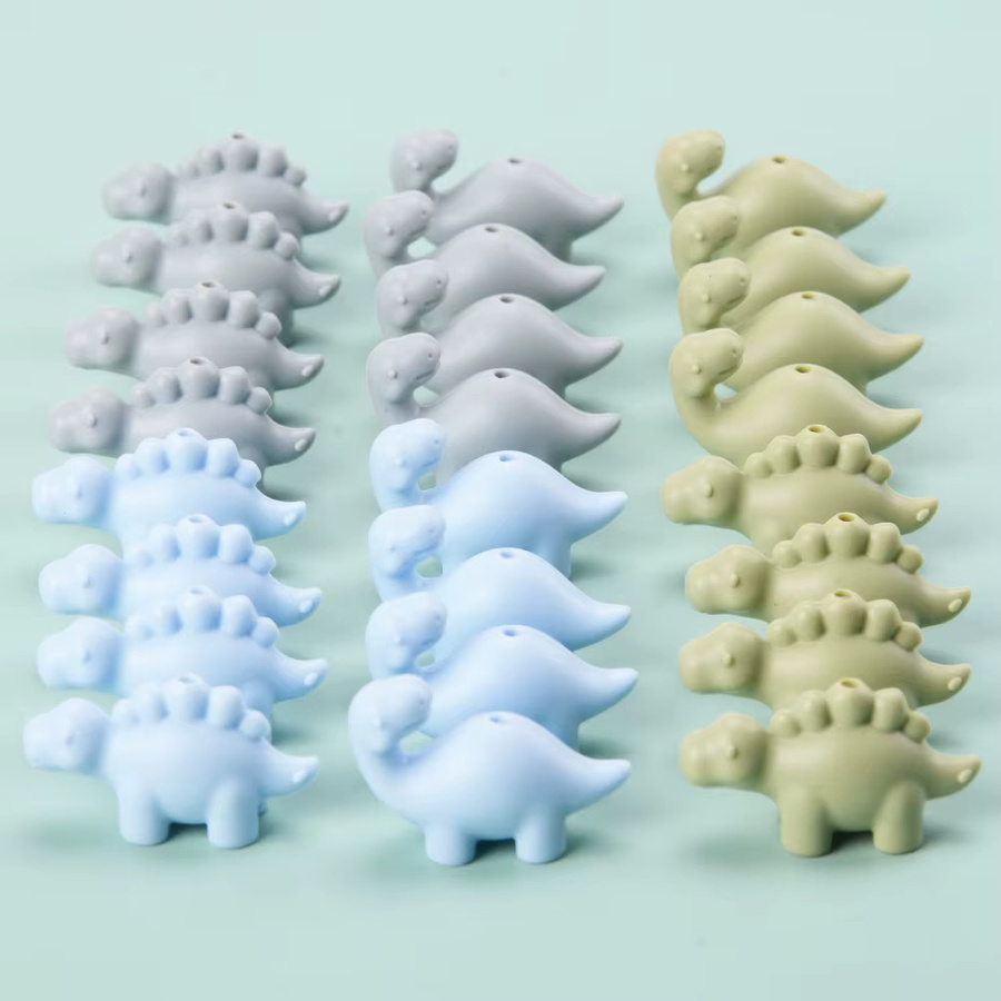 LOFCA 24 Stück Mini-Silikon-Dinosaurier-Perlen BPA-frei in Grau und Mehrfarbig für DIY Beißketten und Schmuck - Bild 1