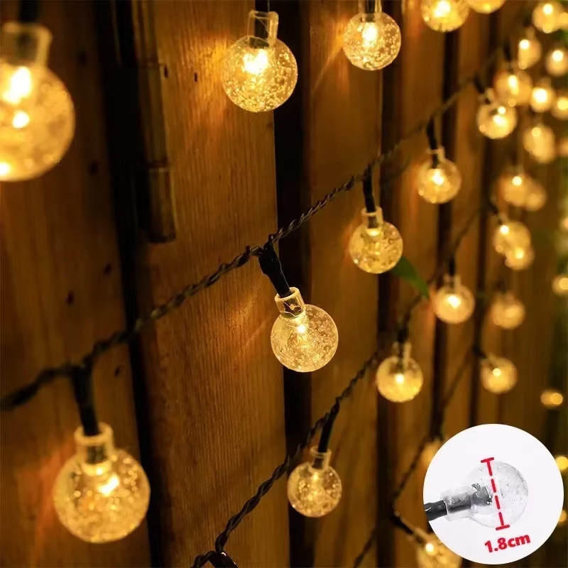 IEEYEEY Solar-Lichterkette mit 100 warmweißen LEDs und transparenten Kristallkugeln aus Glas für den Außenbereich - Bild 5